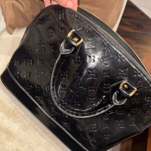 Louis Vuitton Black Satchel with Monogram Embossed Design